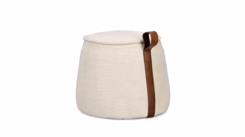 Taburet Anila Light Natural, tapitat cu material tip chenille, umplutura densa pentru confort si maner decorativ din piele ecologica. Design modern si elegant.